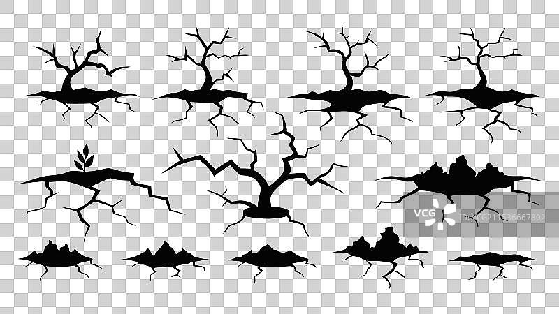 地面表面的黑色裂缝和断裂图片素材