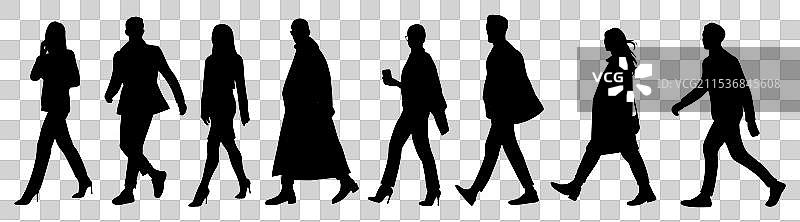 商务人士侧面行走的剪影图片素材