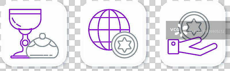 手持犹太硬币的酒杯，庆祝光明节图片素材