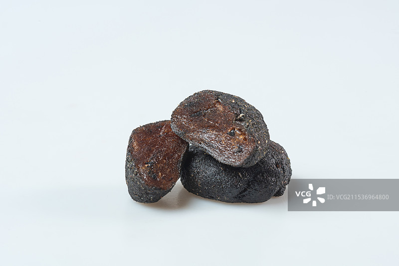 孤立在白色背景上的传统小吃茶点酸枣糕酸枣饼特写图片素材