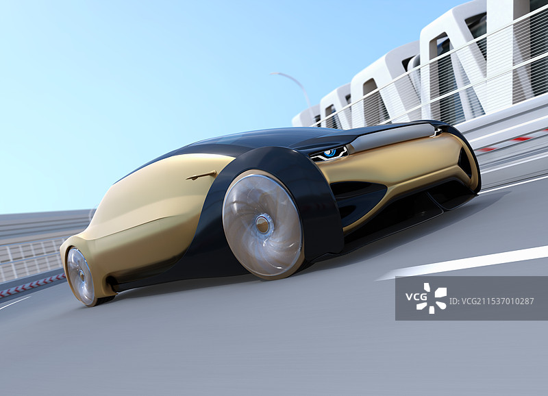 一辆自动化豪华轿车以高速行驶穿过弯道图片素材