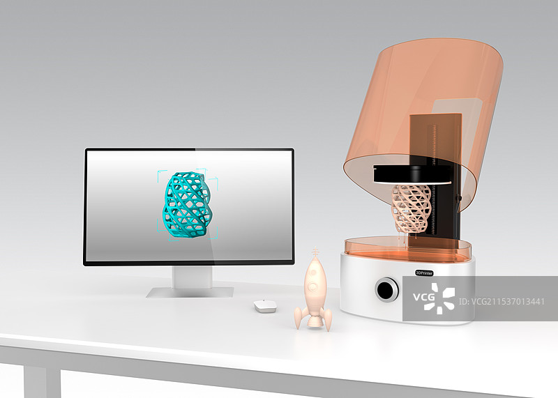 照片制造的3D打印机和笔记本电脑。3D模型显示在电脑屏幕上。图片素材