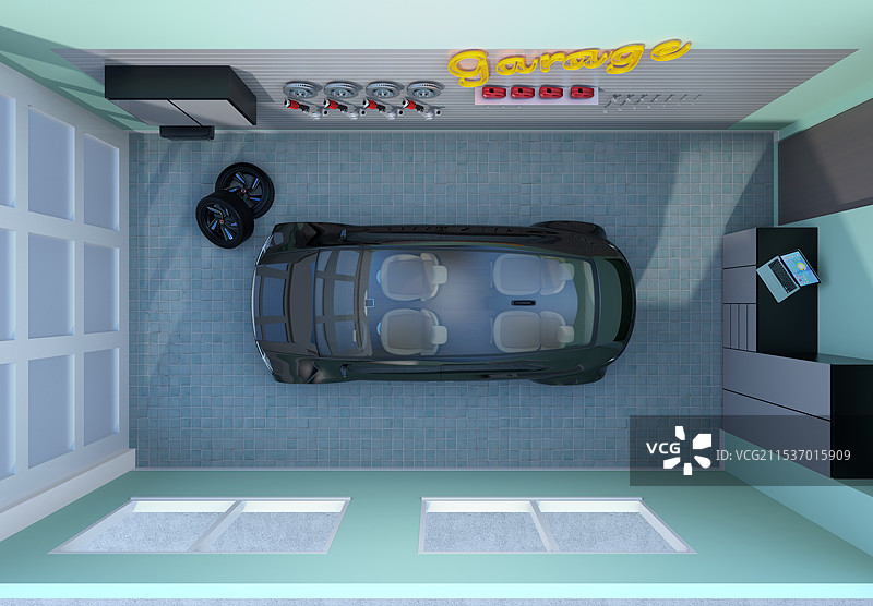 鸟瞰图，车库内停着一辆黑色电动车图片素材