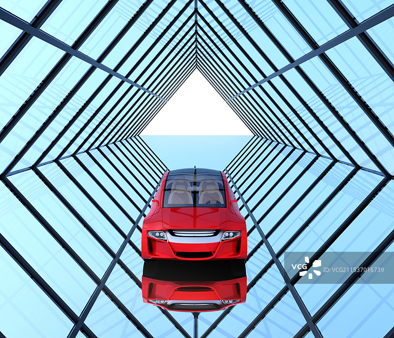 红色三轮车在对称的玻璃隧道中图片素材