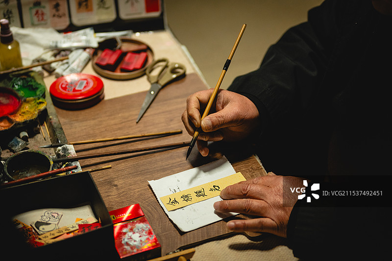 街头手写金榜题名的艺术家图片素材