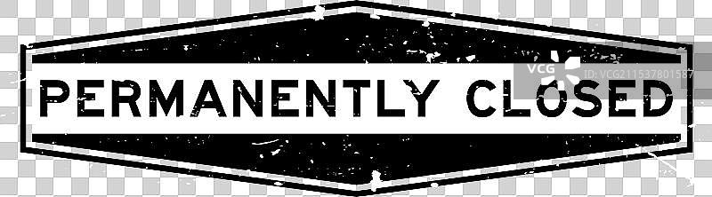 破旧的黑色六边形“永久关闭”字样图片素材