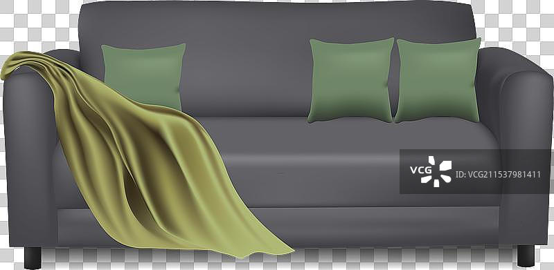 灰色沙发上放着毯子和抱枕图片素材