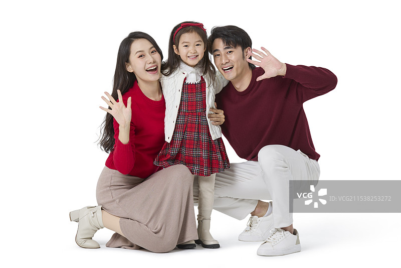 快乐的一家三口庆祝新年图片素材