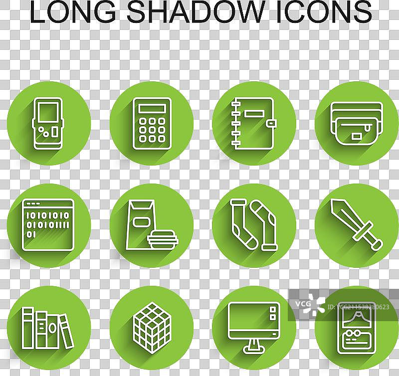 书本、魔方、俄罗斯方块和电脑显示器的排列图片素材