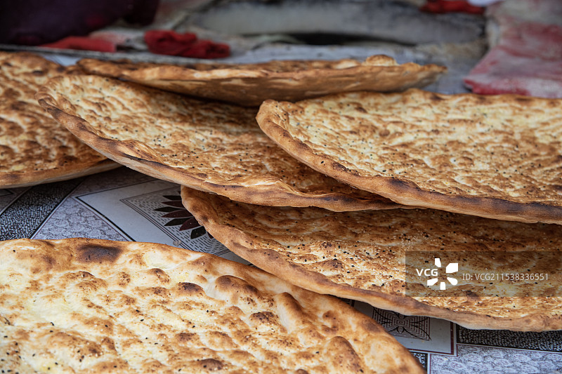 新疆打馕图片素材