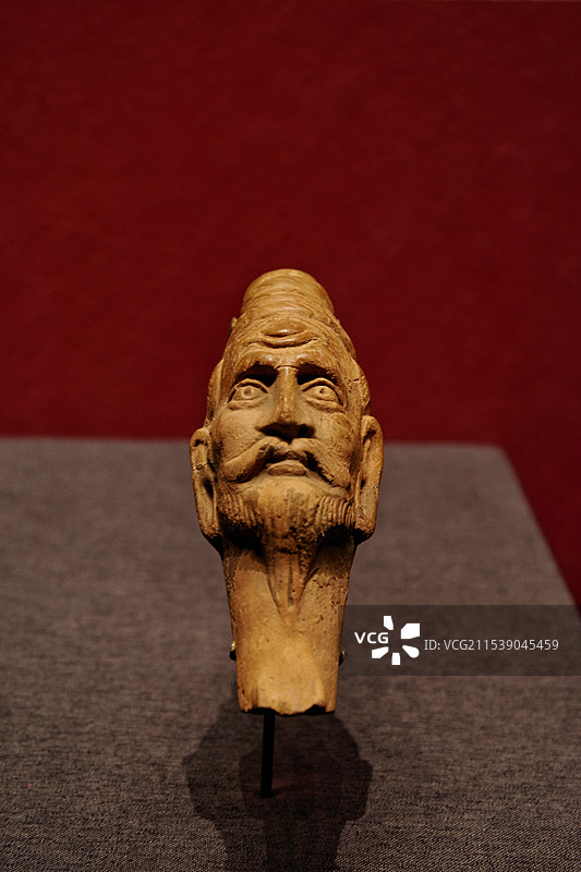 人首怒像陶饮器 唐代（公元 618-907年) 和田县约特干遗址出土 新疆维吾尔自治区博物馆藏图片素材