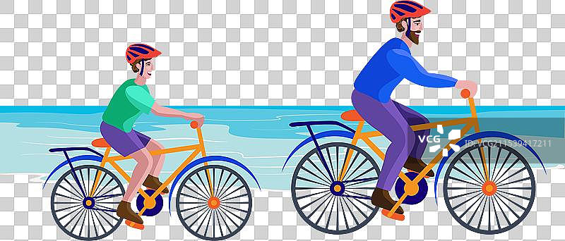 父亲和儿子在海岸骑自行车图片素材