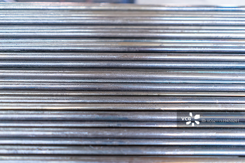 中国钢铁加工工厂拍摄主题，车间里一堆细的钢管建材材料，室内无人图像摄影图片素材