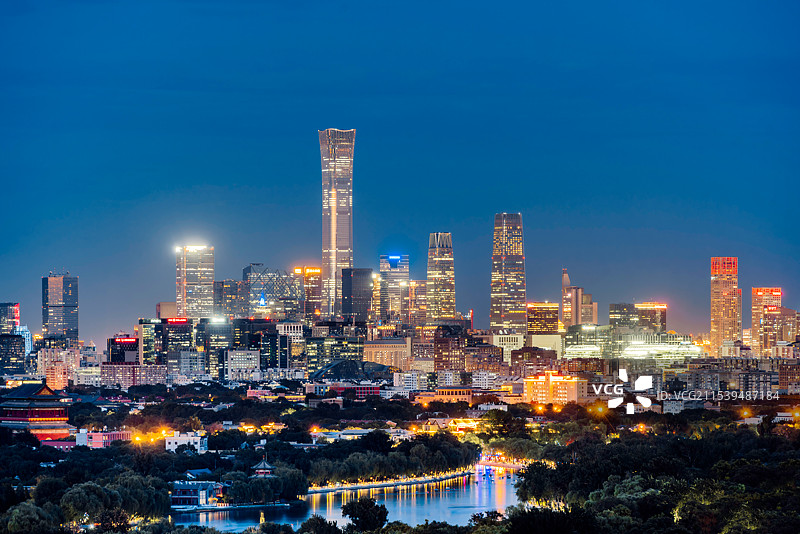 中国北京国贸CBD和钟鼓楼古今对照高视角城市天际线夜景图片素材