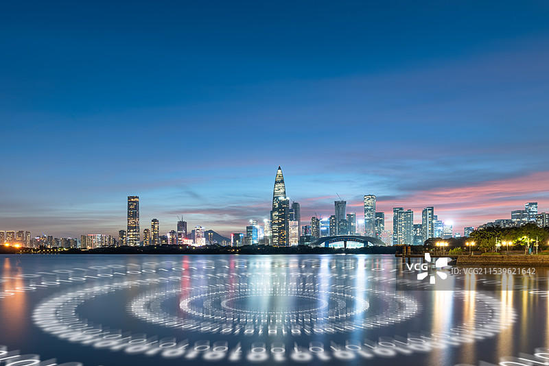 深圳城市天际线夜景风光和科技智慧城市概念图片素材
