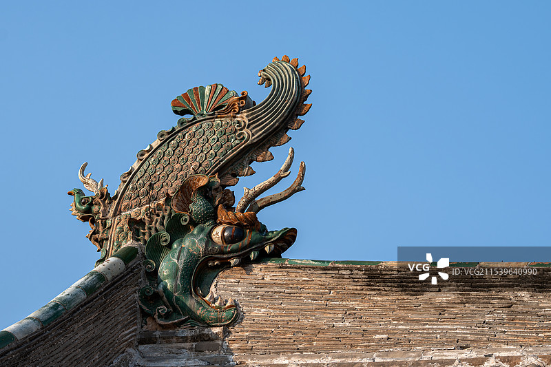 山西永乐宫古建筑房顶琉璃脊兽龙头图片素材