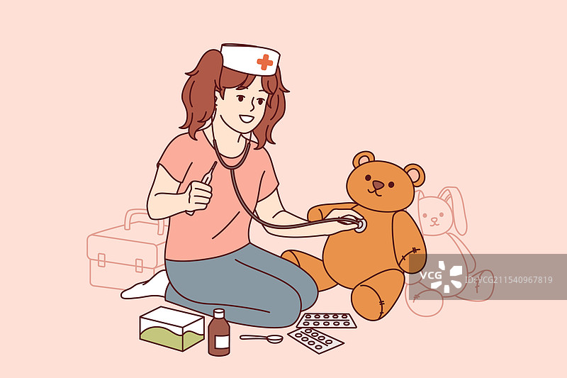 小女孩玩医生，使用听诊器和图片素材