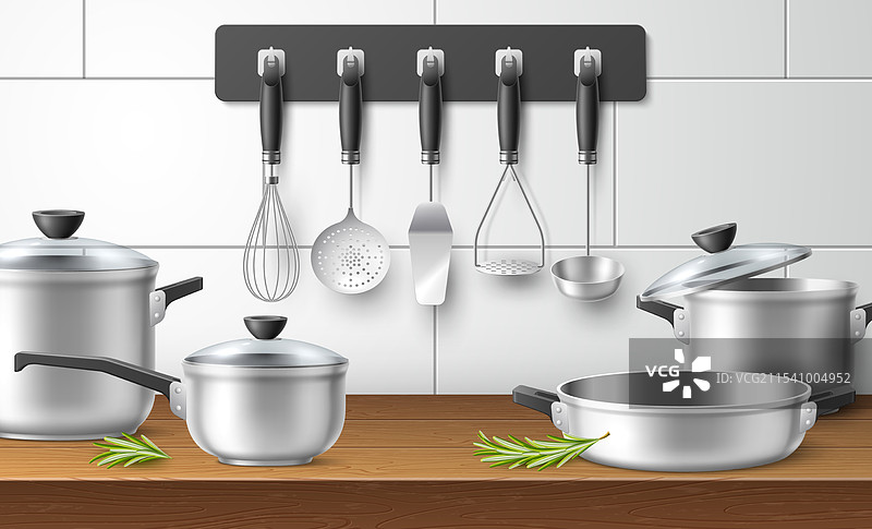 厨房用具，真实的炊具放在木制台面上图片素材