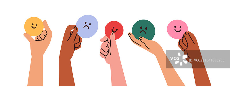 手握表情符号，快乐与悲伤的面孔表情图片素材