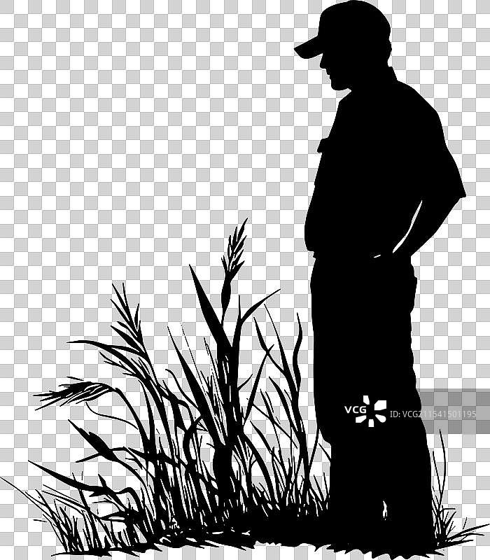 农民凝视庄稼的剪影图片素材