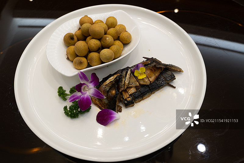 龙眼和熏鱼图片素材