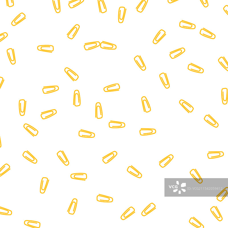 背景上散落着许多回形针。图片素材