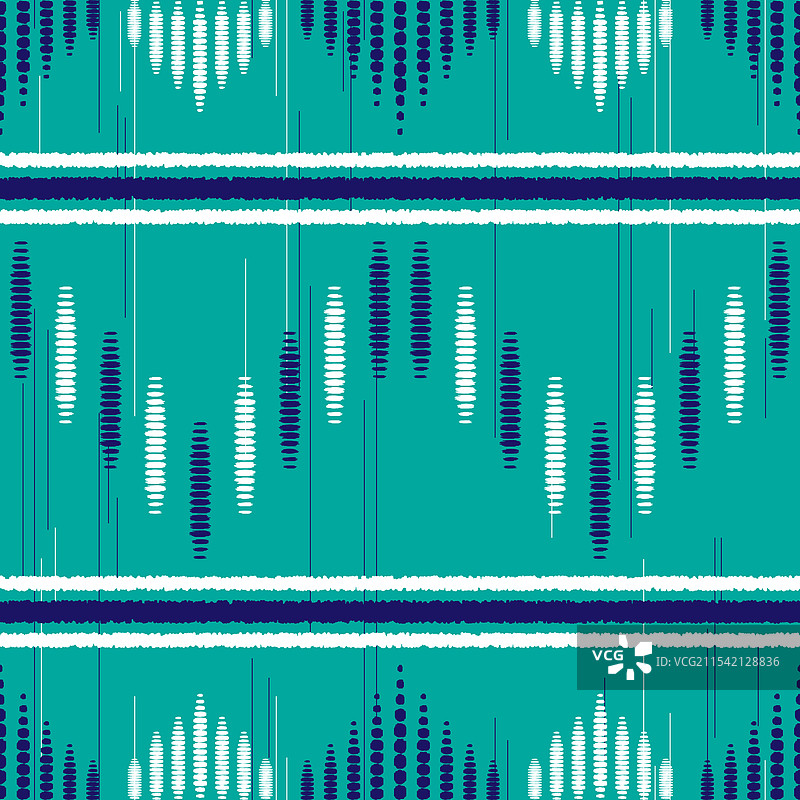 民族抽象伊卡特艺术在绿色背景上图片素材