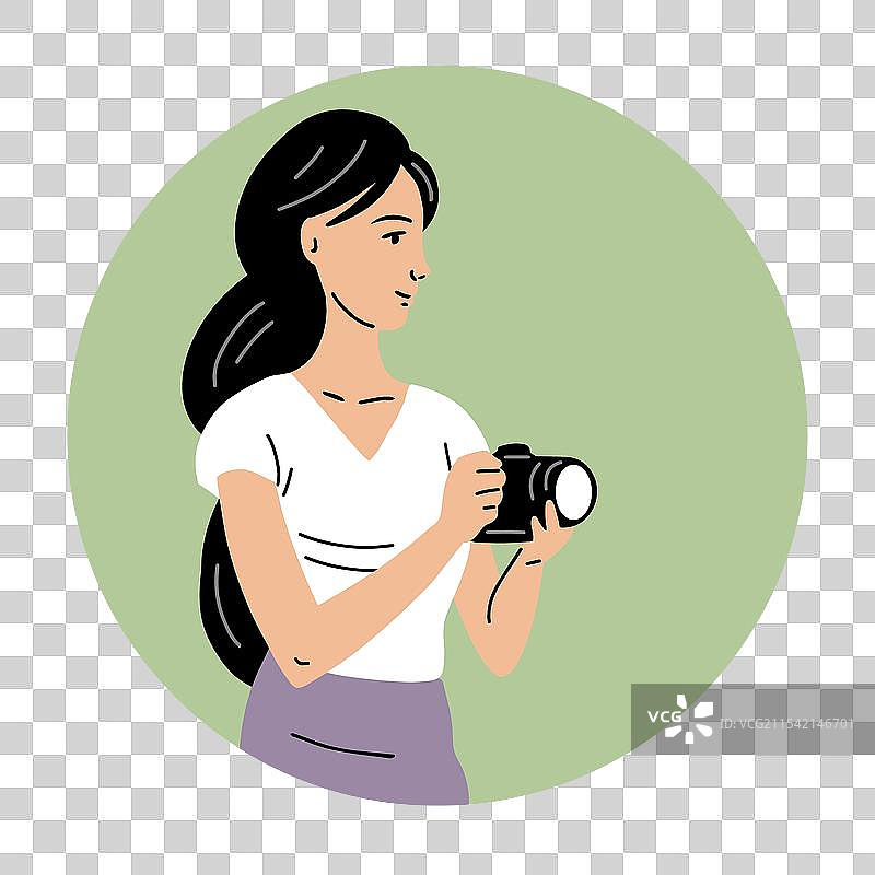 一位年轻美丽的女性在画布上作画图片素材