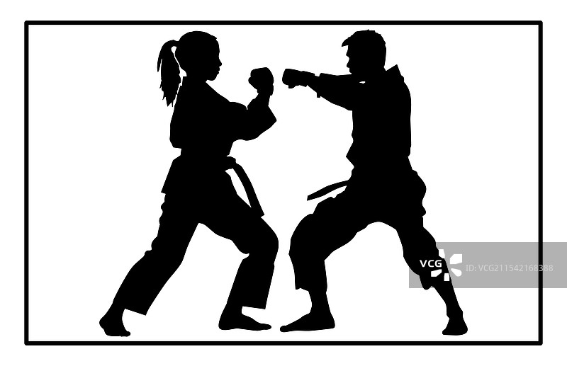 空手道女战士与男战士之间的战斗图片素材