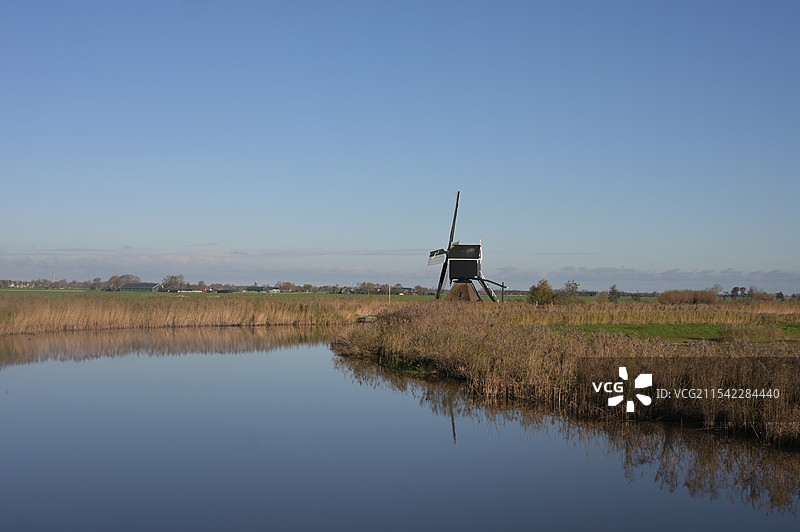 荷兰小孩堤防的风车图片素材