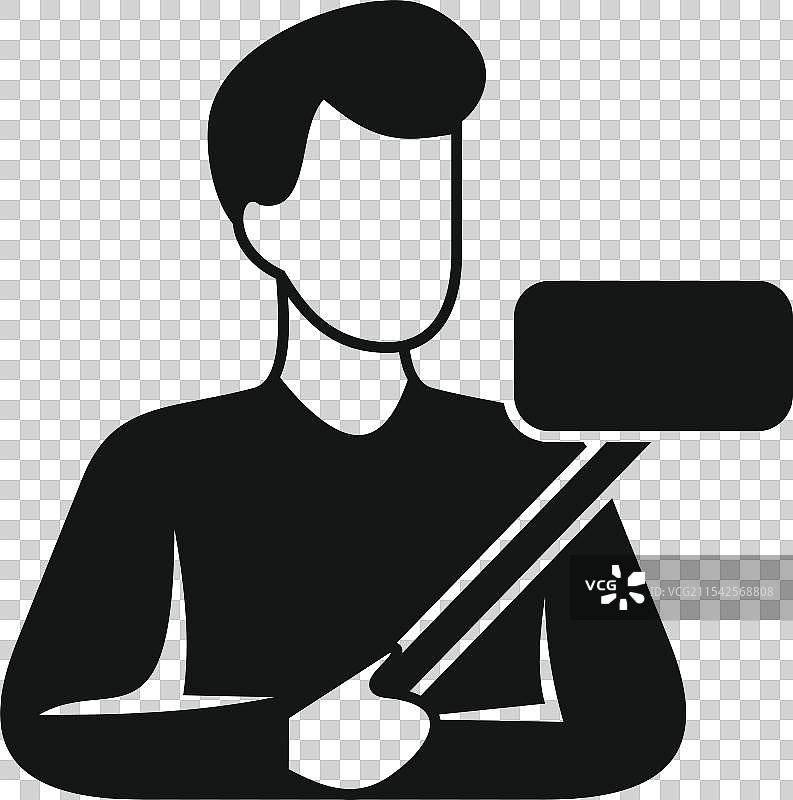 博主手持自拍杆进行视频博客拍摄图片素材