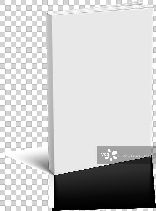 光滑桌面上的白色软封面书籍模型图片素材