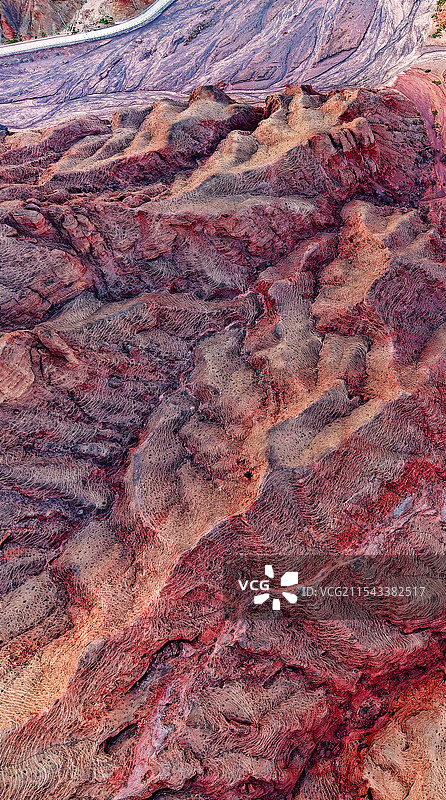 航拍竖画幅西北高原五彩山峰雄浑自然风光图片素材