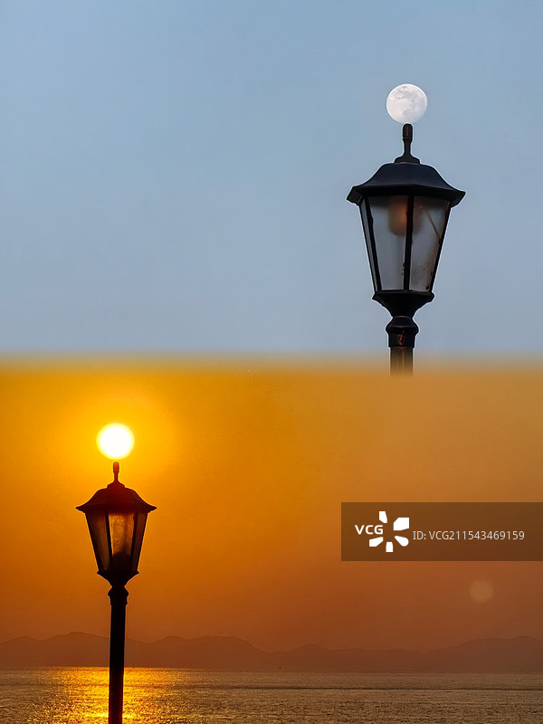 青岛小麦岛月升日落图片素材