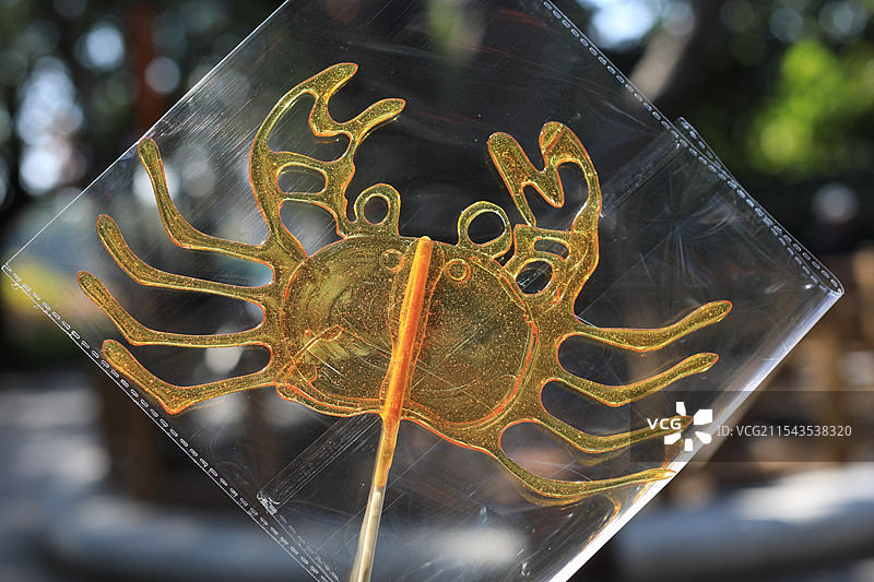 中国糖画螃蟹，古老的非物质文化遗产图片素材