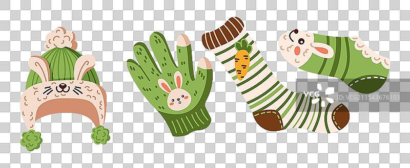 可爱的冬季服装，带有兔子装饰，平铺展示图片素材