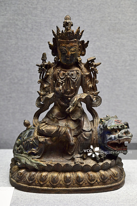 中国甘肃省平凉金铜造像文物《铜文殊菩萨坐像》，明代，平凉市泾川县博物馆 藏图片素材