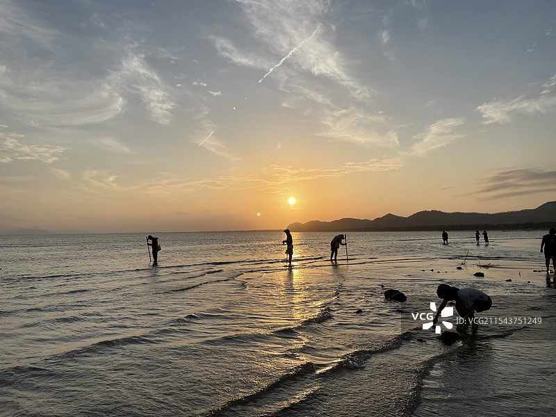 金厢银滩落日图片素材