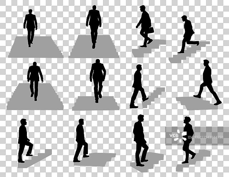 走在楼梯上的男人，正向上走。图片素材