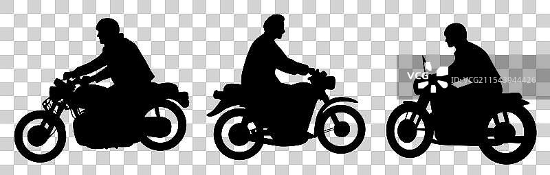 男人骑着摩托车在路上行驶图片素材