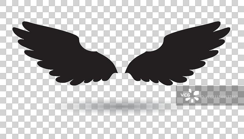 白色背景上的翅膀剪影图片素材