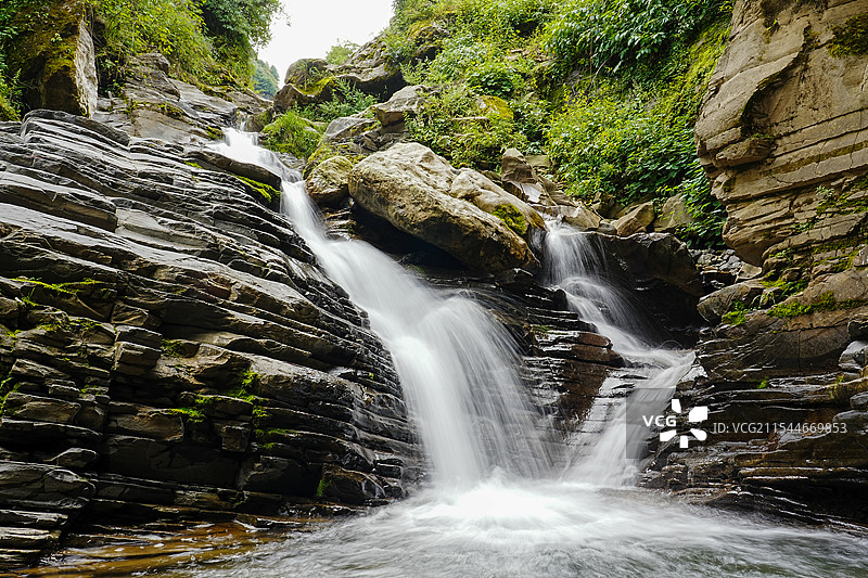 雪乡瀑语 石上流光图片素材