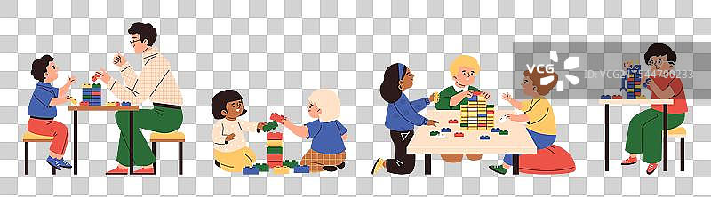 快乐的孩子们在玩乐高积木图片素材