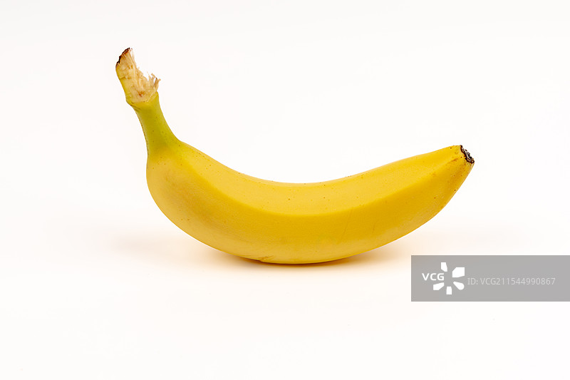 白色背景下的一个成熟的香蕉图片素材