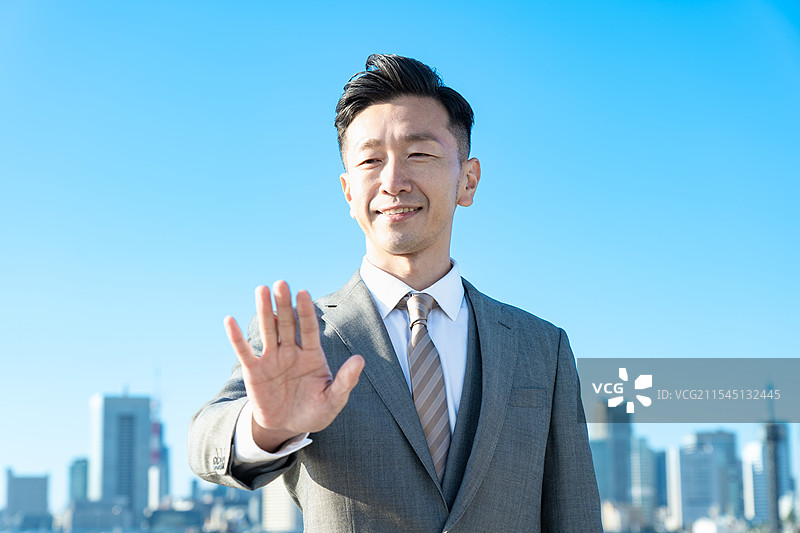商人举起手来图片素材