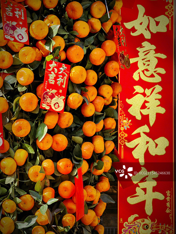 金桔迎春，在大门口摆上年桔是南国迎春的传统，预示着团圆，吉祥，如意。拍摄时间图片素材
