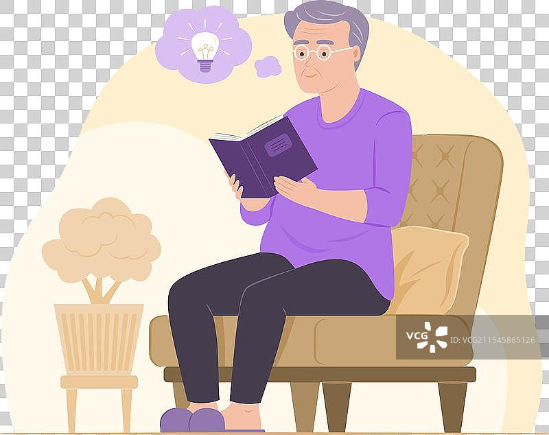 一位老年男子坐在沙发上阅读一本书图片素材