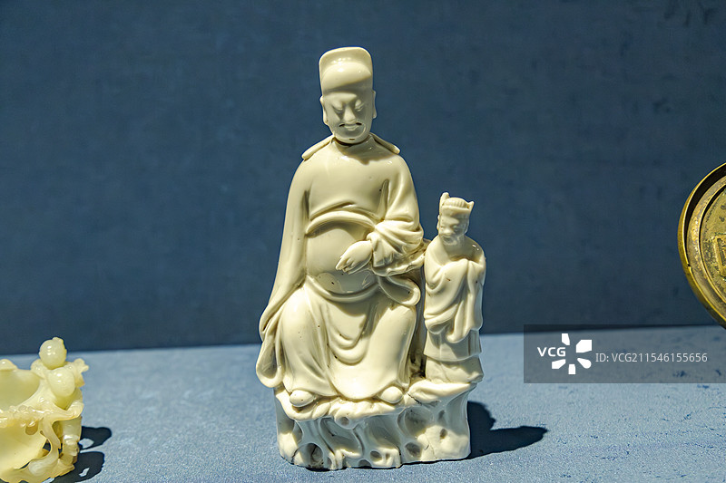 北京故宫博物院大道之行儒家文化特展文物清朝德化窑白釉文昌像图片素材