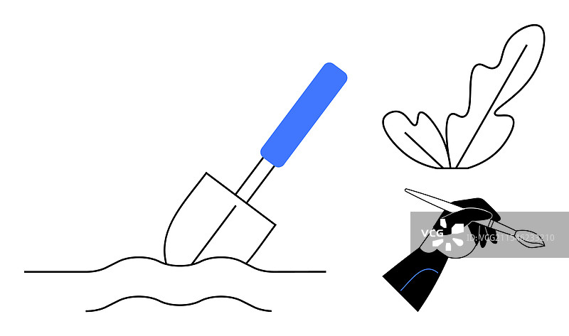 手握画笔的叶子图片素材