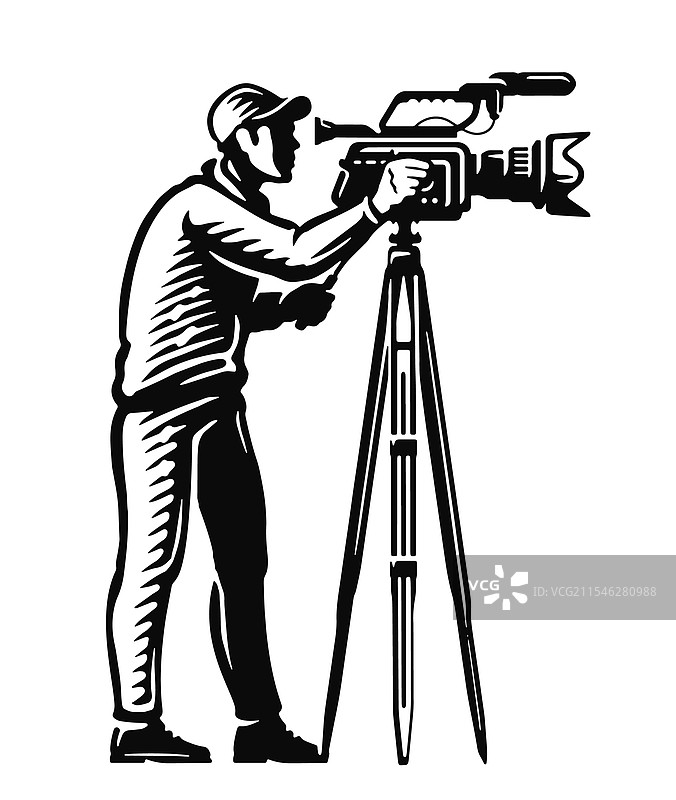 专业摄像师正在操作摄像机图片素材